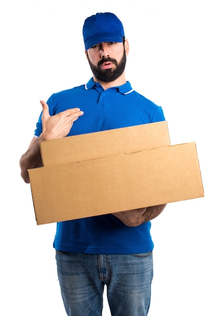 Delivery man doing surprise gesture