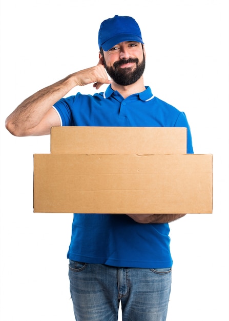 Delivery man making phone gesture