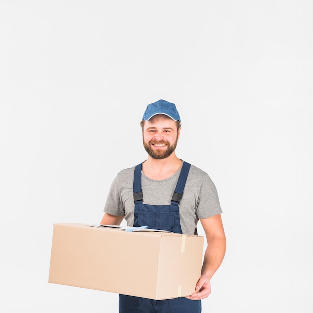 Delivery man standing with big box 