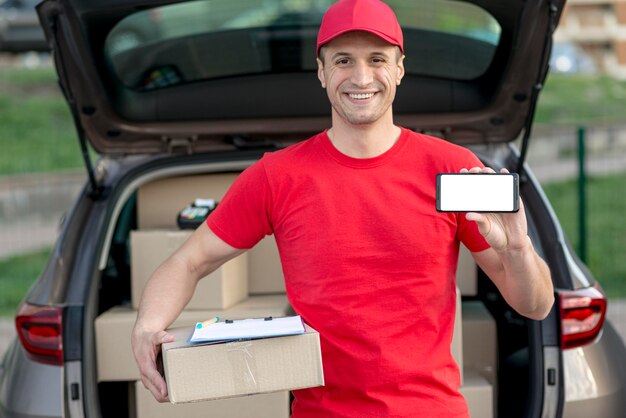 Delivery man with smartphone