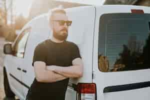 Free photo delivery man with white van