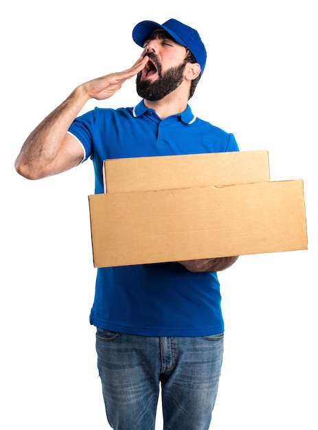 Delivery man yawning