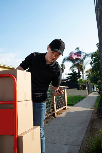 Delivery person getting parcel out for delivery