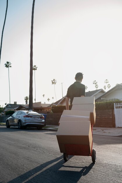 Delivery person getting parcel out for delivery