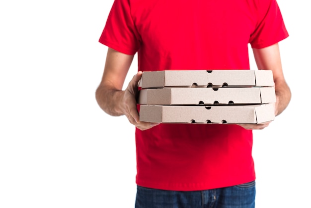 Free photo delivery pizza boy and boxes for foodstuff