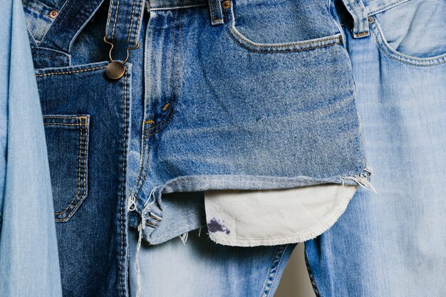 Denim clothes hanging close-up