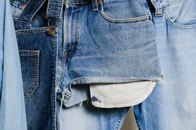 Denim clothes hanging close-up