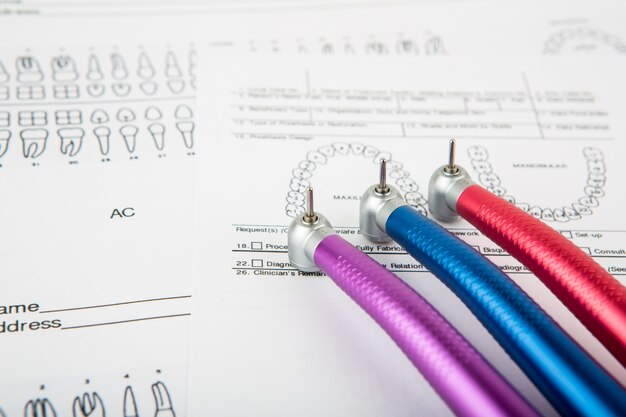 Dental tools and equipment on dental chart