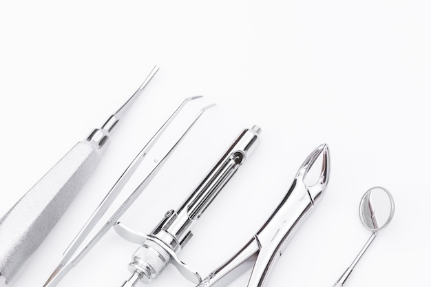 Free photo dental tools and equipment on white background