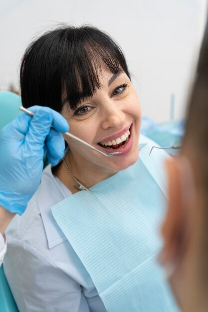 Dentist doing a check up on the patient