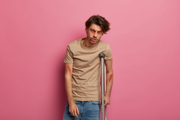 Depressed man with crutches suffers because of driver negligence