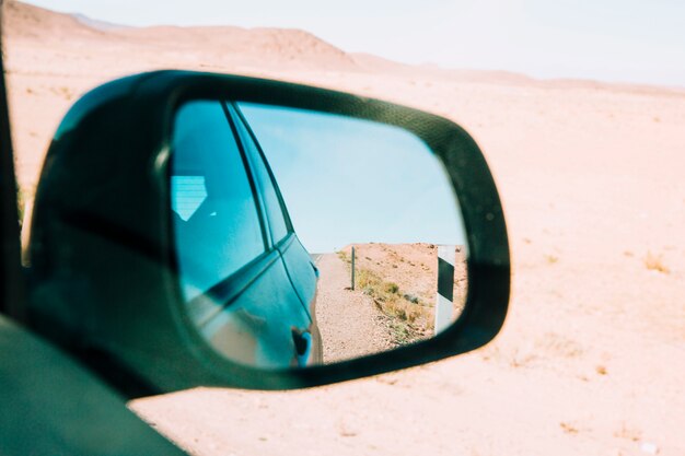 Desert in car mirror