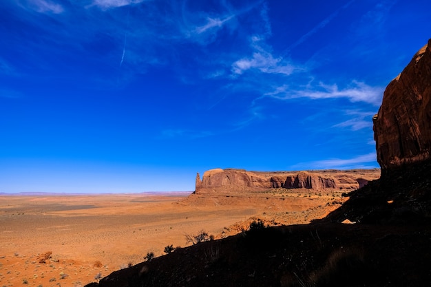 Desert mountain in the distance with blue sky on a sunny day