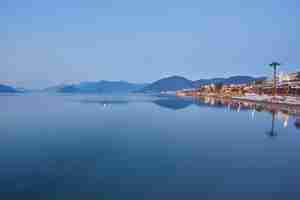 Free photo deserted beach in the morning sun the beach at dawn empty sunbeds beach without people marmaris