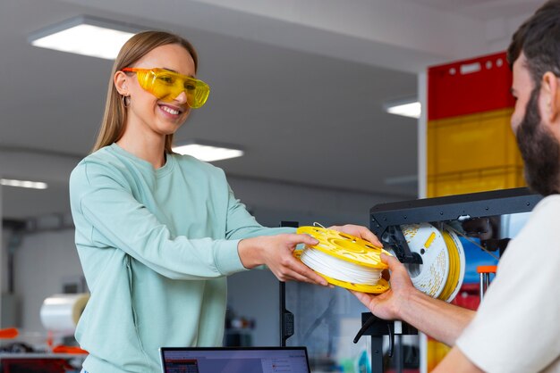 Designers using a 3d printer