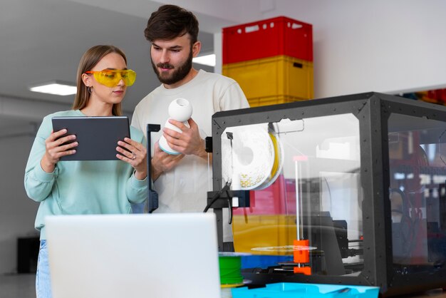 Designers using a 3d printer
