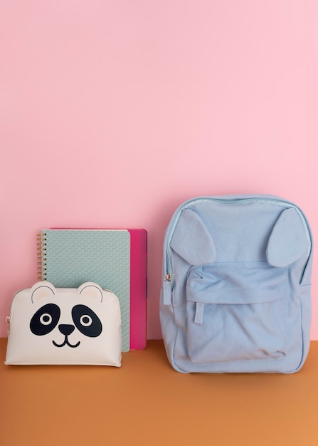 Free photo desk arrangement with backpack