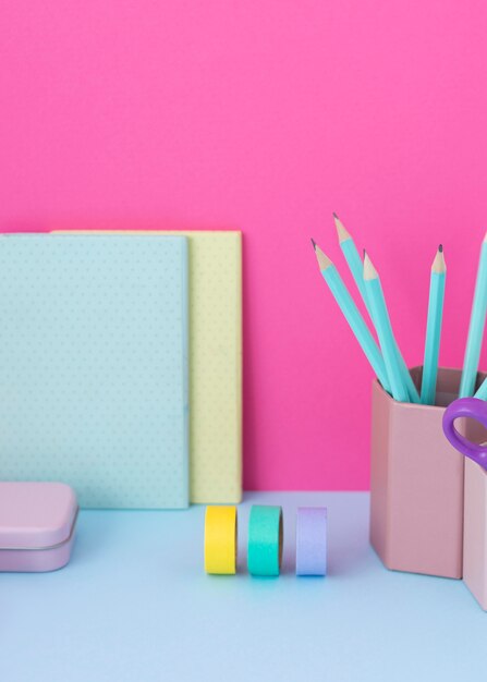 Desk arrangement with colorful tape high angle