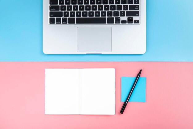 Desk arrangement with empty notepad