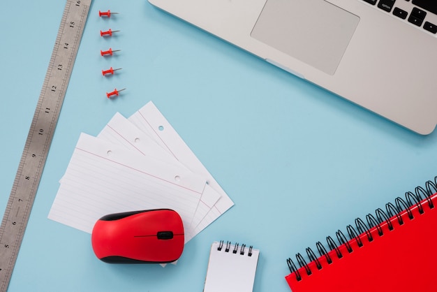 Free photo desk arrangement with laptop flat lay