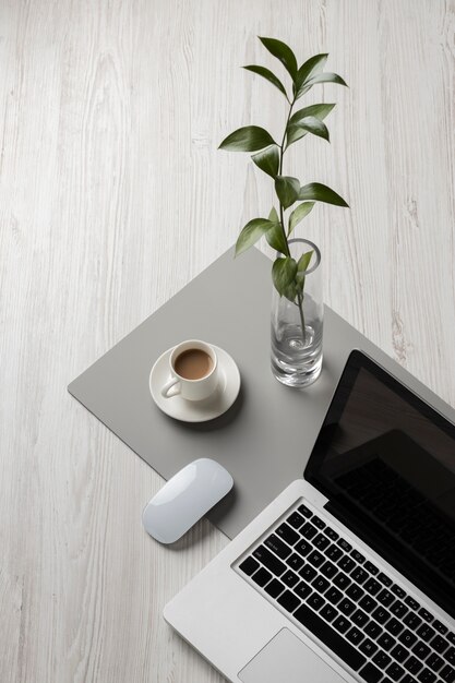 Desk arrangement with laptop high angle