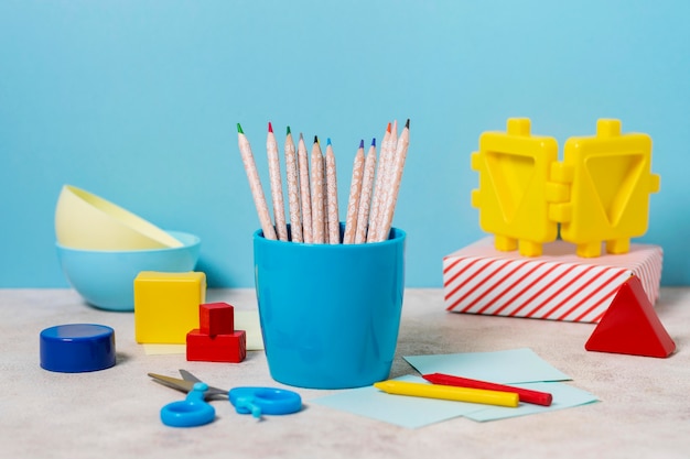 Desk arrangement with pencils and scissors