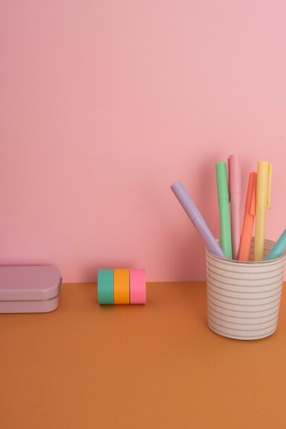 Desk assortment with colorful pens