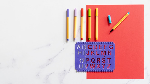 Desk copy space with colorful markers