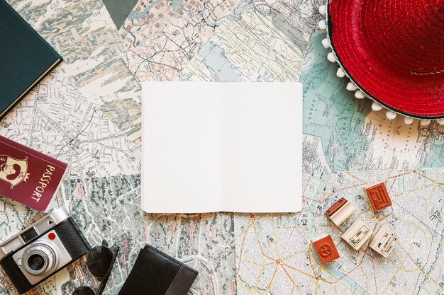 Desk with notepad and travel stuff