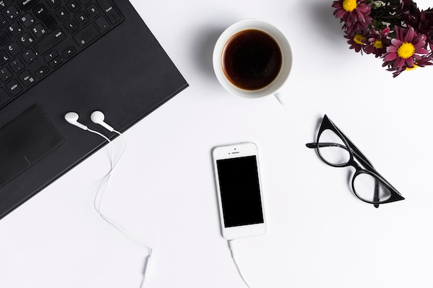 Desk workspace with various elements