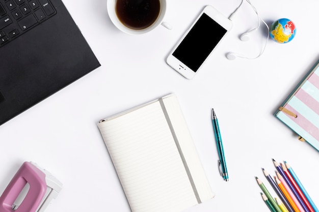 Desk workspace with various elements