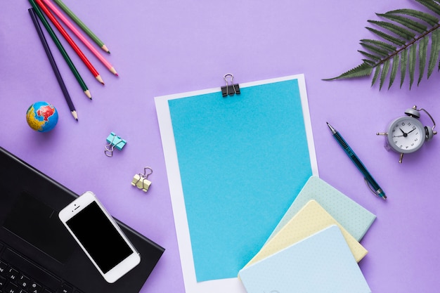 Desk workspace with various elements