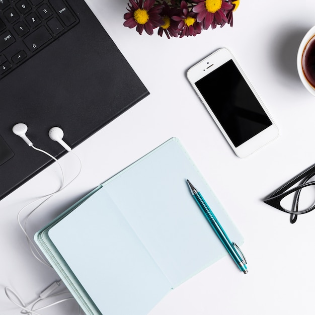 Desk workspace with various elements