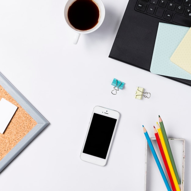 Desk workspace with various elements