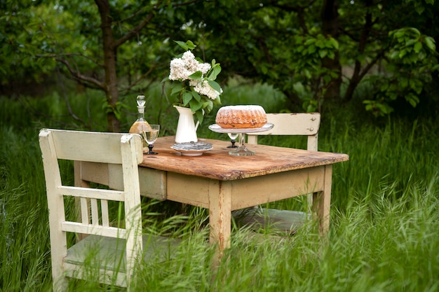 Dessert and flowers on table arrangement