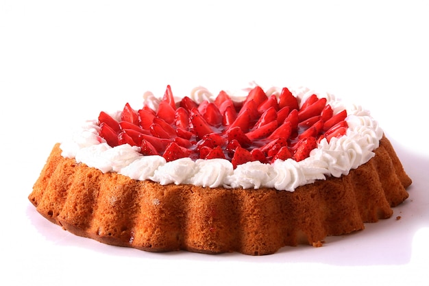 Dessert fruitcake cake with whipped cream