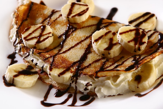 Dessert plate with pancakes and banana