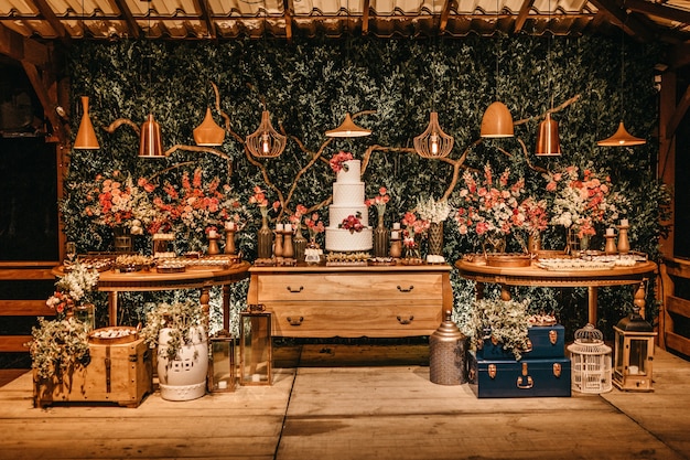 Dessert tables with a beautiful big cake and various pastries