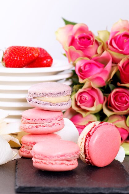 Dessert on valentine's with macaroons, coffee and strawberry