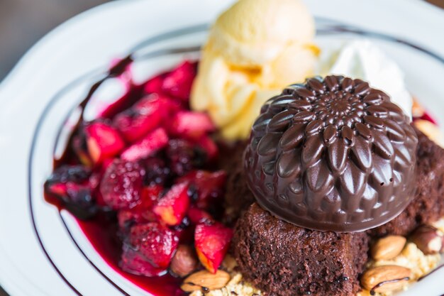 Dessert with strawberries and chocolate ice cream