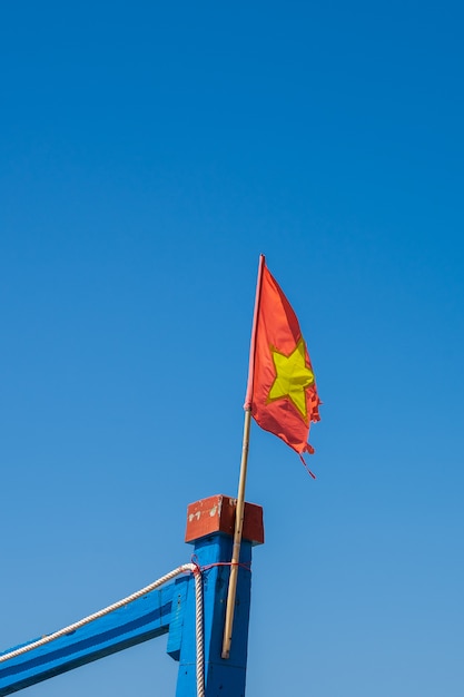 Detail of an old Vietnamese flag flying