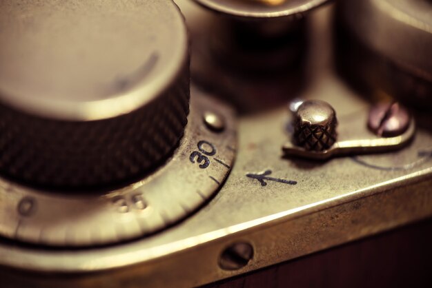 Detail of an old vintage film camera. Macro photo