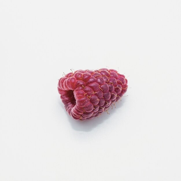 Detail of raspberry isolated on white background