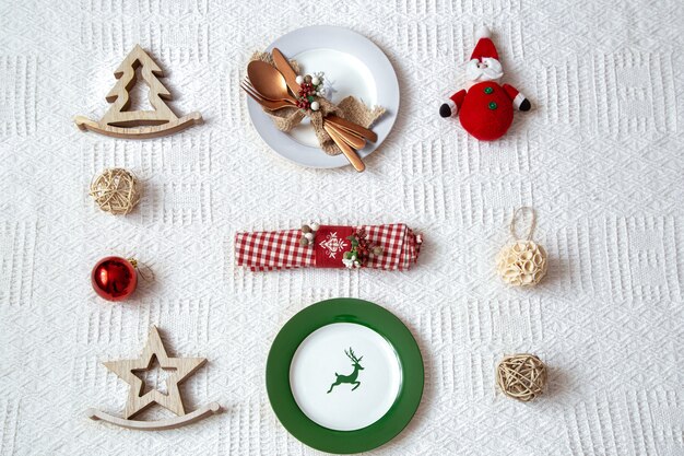 Details for Christmas table setting on white background close up.