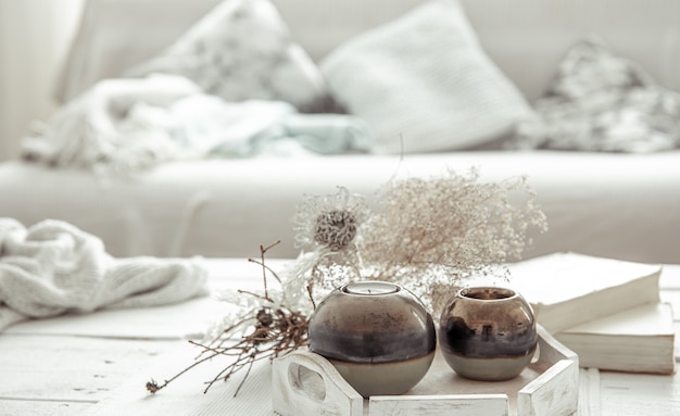 Free photo details of the decor on the table in the living room in a hygge style