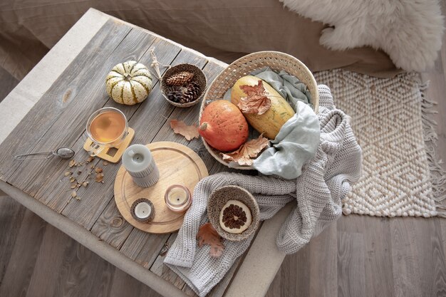 Details of home autumn decor in rustic style in the interior of the room, top view.