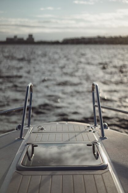 details of the yacht, deck, reflection of the sky.