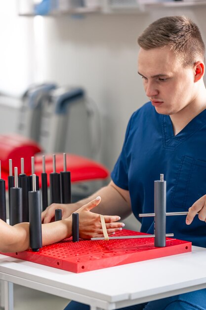 Free photo development of movements of the radial wrist joint on a functional board for the hand