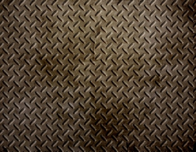 Diamond plate background with a grunge effect