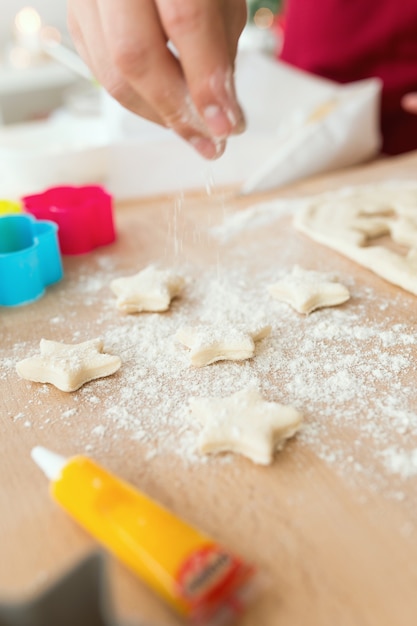 Dice stars cut with a mold with flour